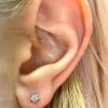 Diamonds small flower earring piercing