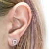 Diamonds karma earring piercing